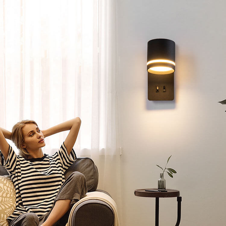 Minimalist LED wall sconce with a rotating reading spotlight