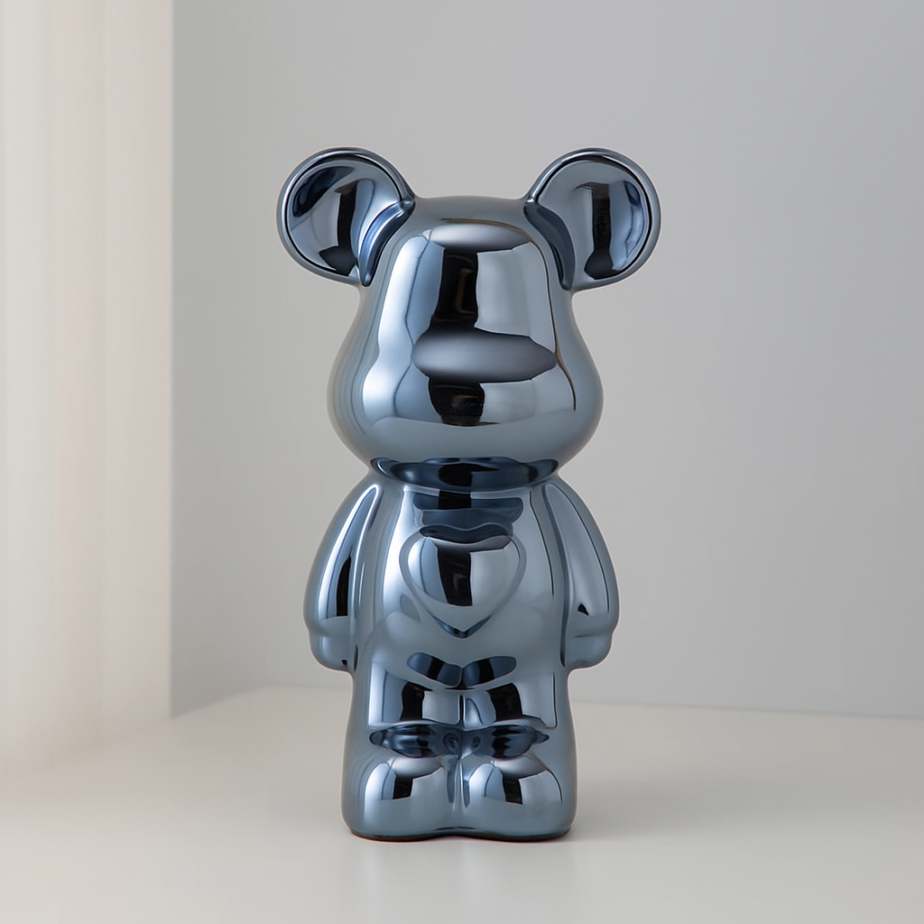 Bear figurine with mirrored metallic surface