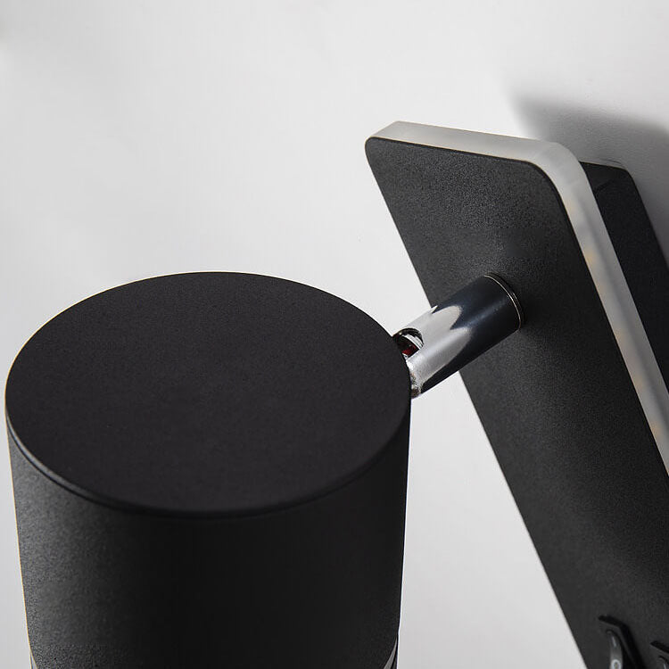 Minimalist LED wall sconce with a rotating reading spotlight