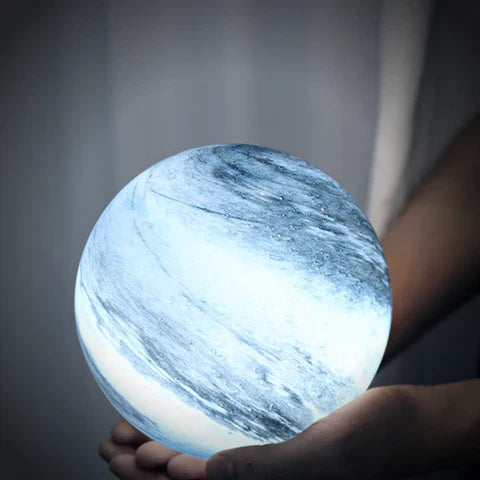 Glass LED table lamp inspired by the moon with cosmic pattern