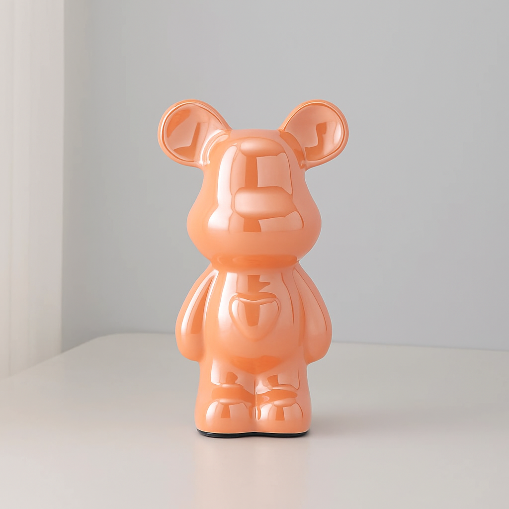 Bear figurine with mirrored metallic surface