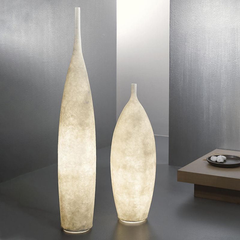 Floor lamp shaped like a bottle with textured surface