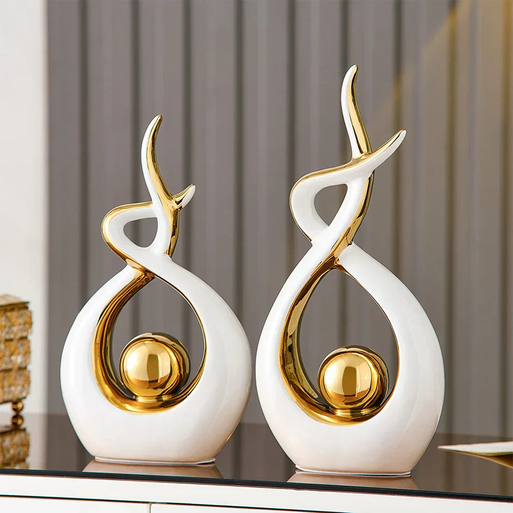 Ceramic abstract figurine with golden sphere