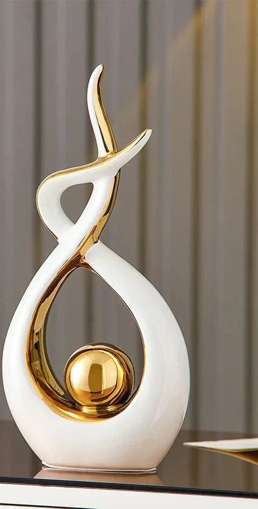 Ceramic abstract figurine with golden sphere