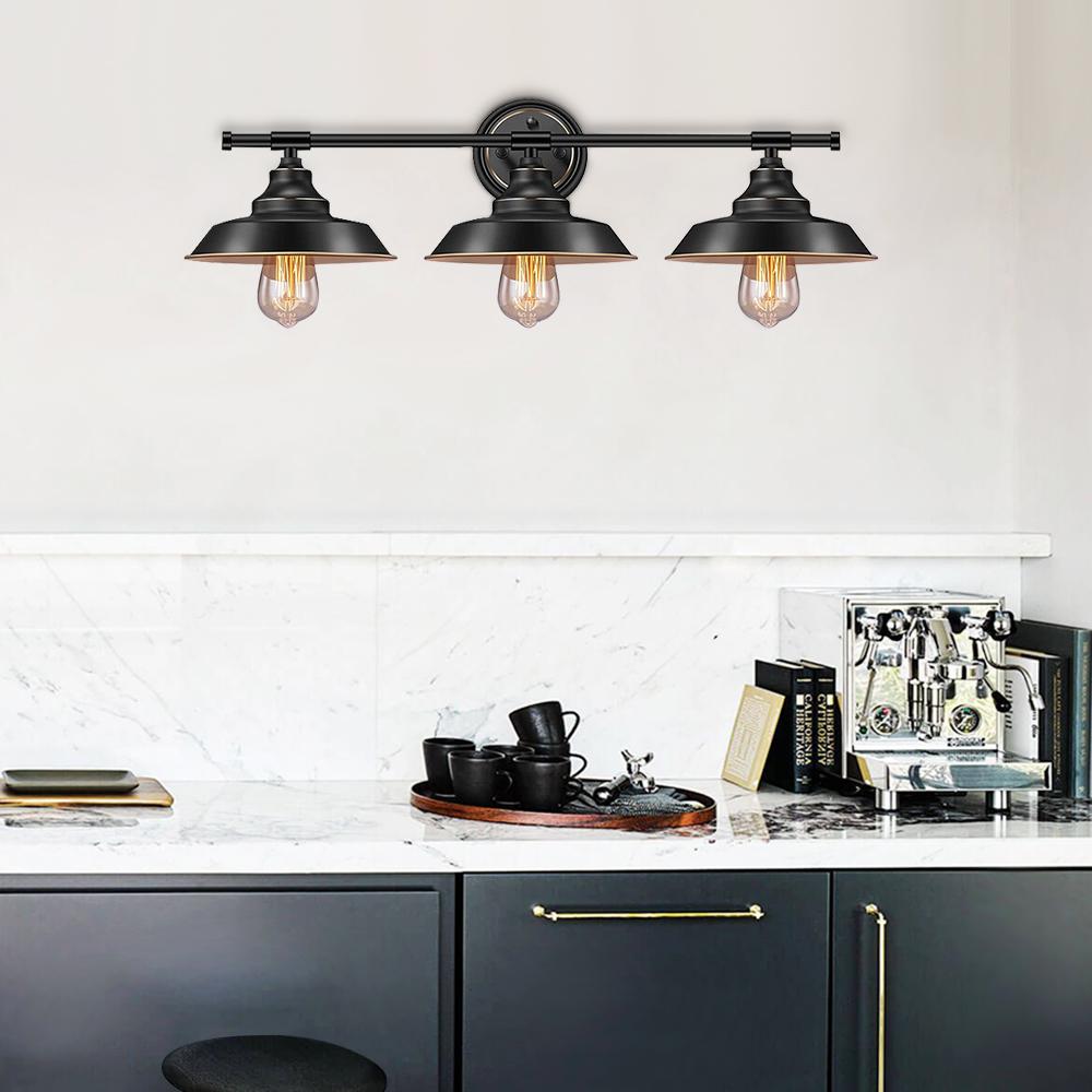 Black country-style wall sconce with three lights and glass shades