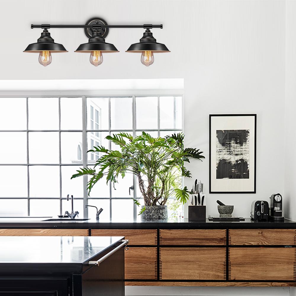 Black country-style wall sconce with three lights and glass shades