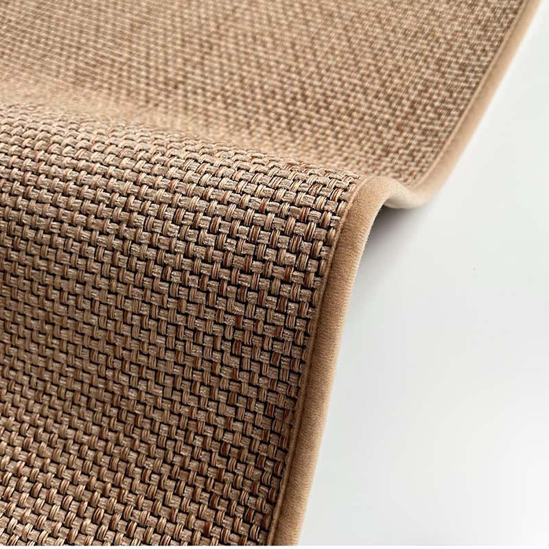 Woven floor mat with textured surface and backing