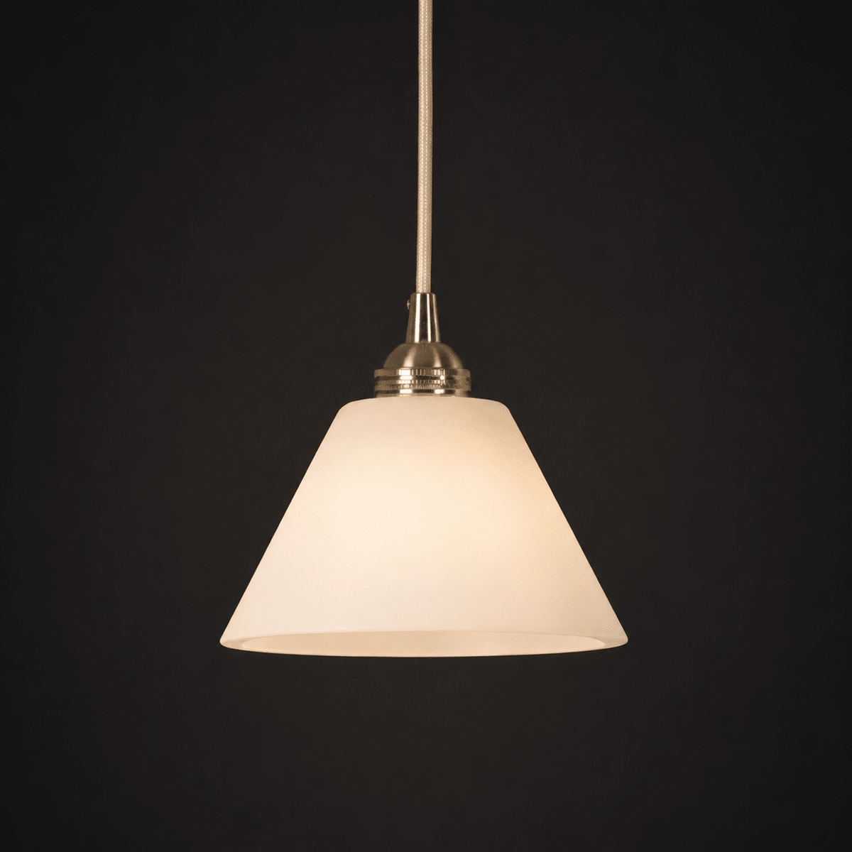 Conical pendant light for the hallway with a brass detail
