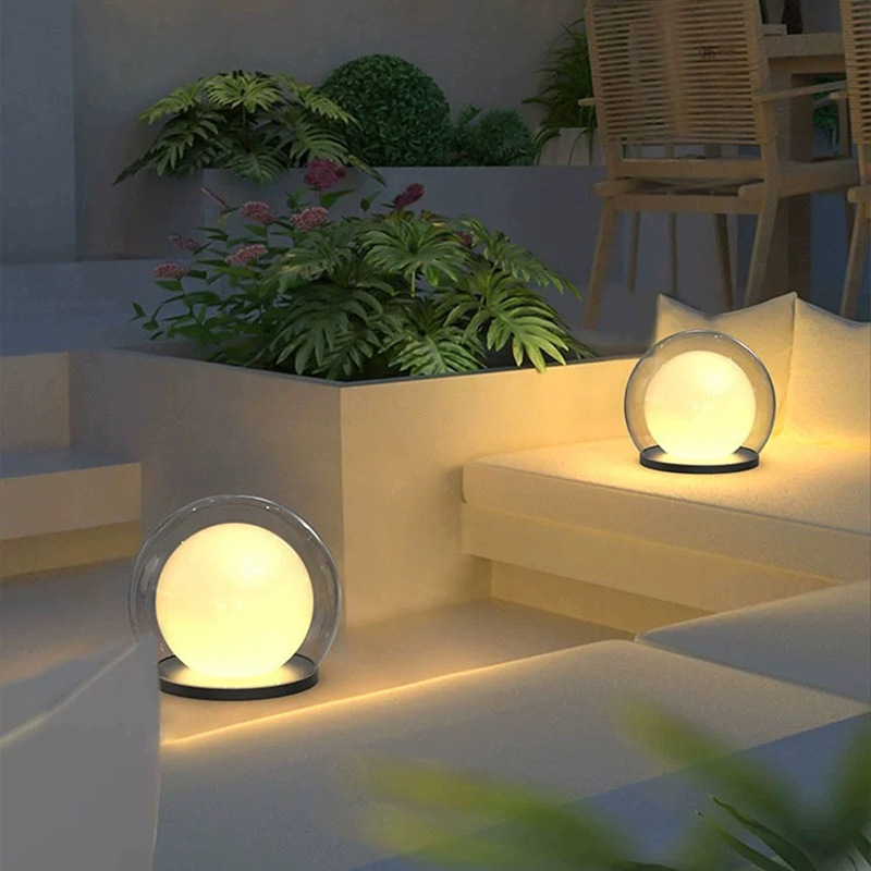 Outdoor wall lamp with glowing moon globe