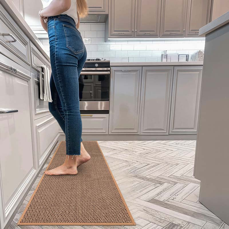 Woven floor mat with textured surface and backing