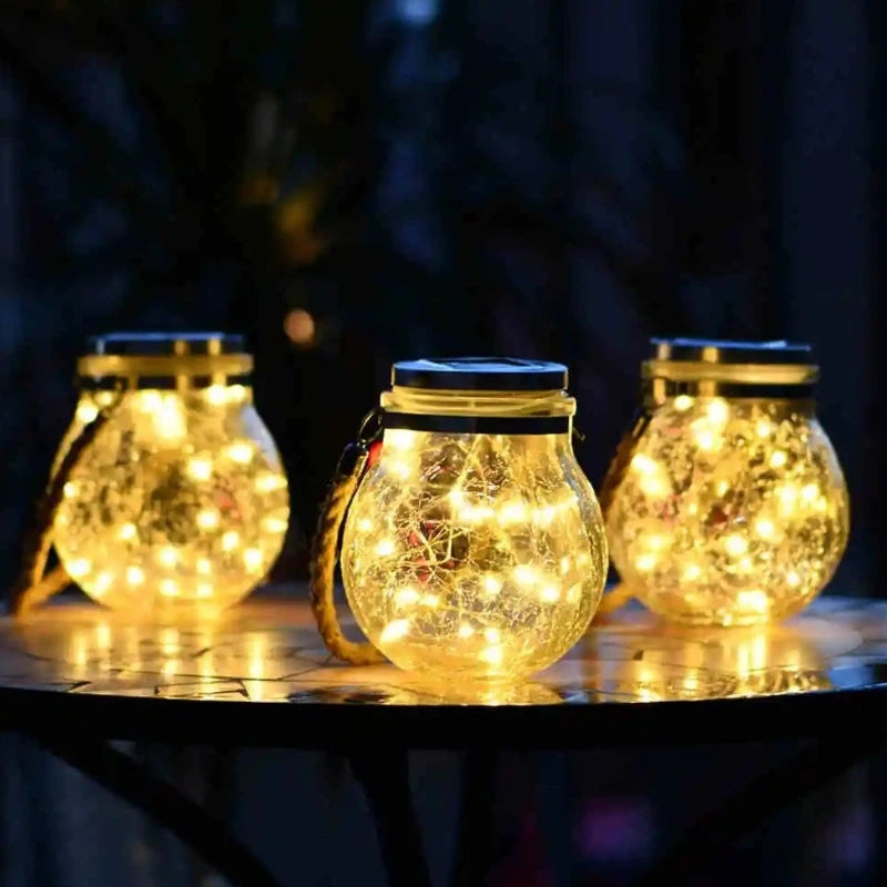 Zewnętrzna lampa wisząca z szklaną kulą i uchwytem z liny