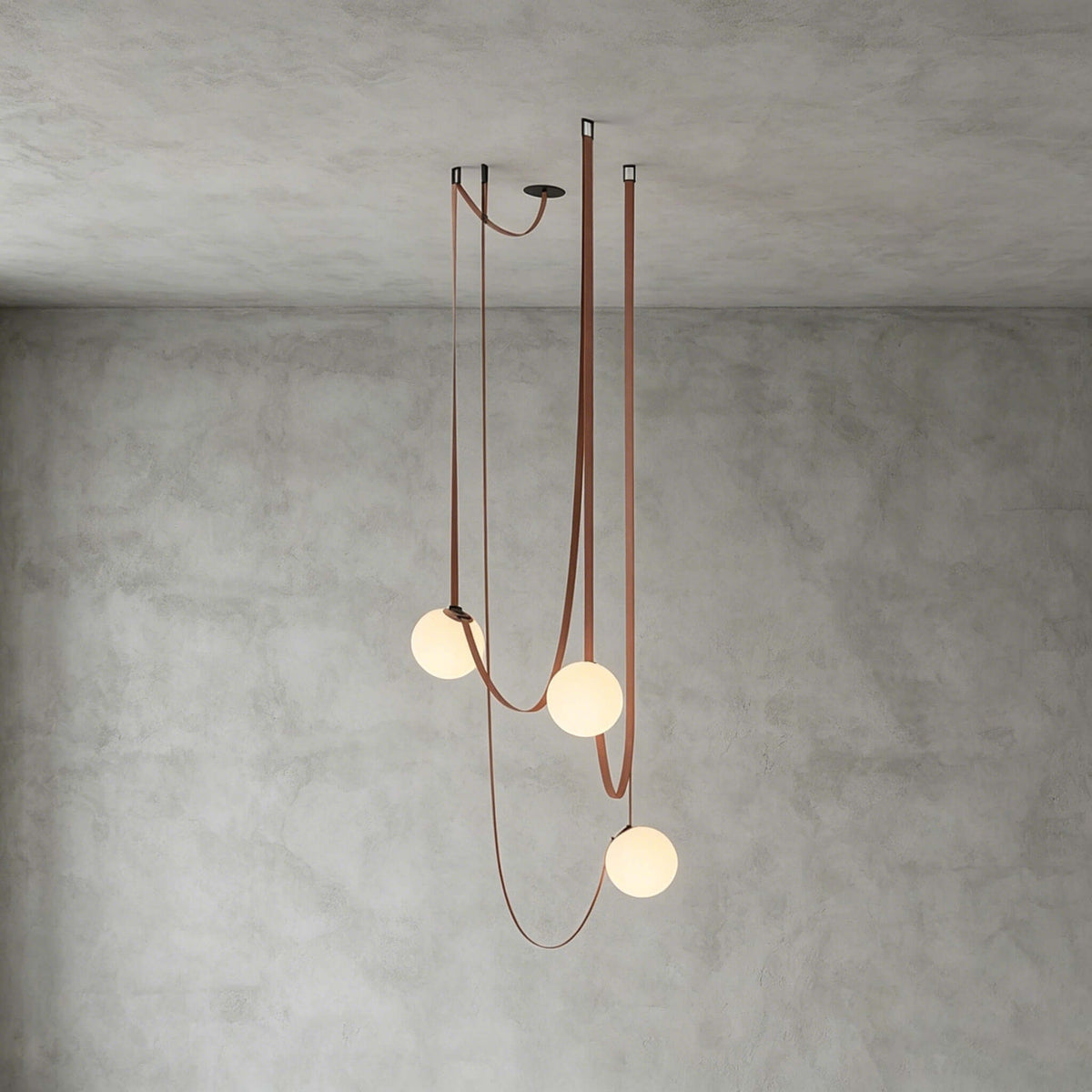 Modern ceiling light with an asymmetrical design and illuminated spheres