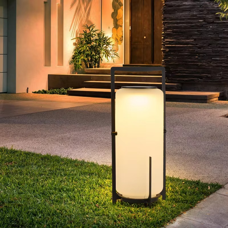 Freestanding solar outdoor lamp with enclosed light