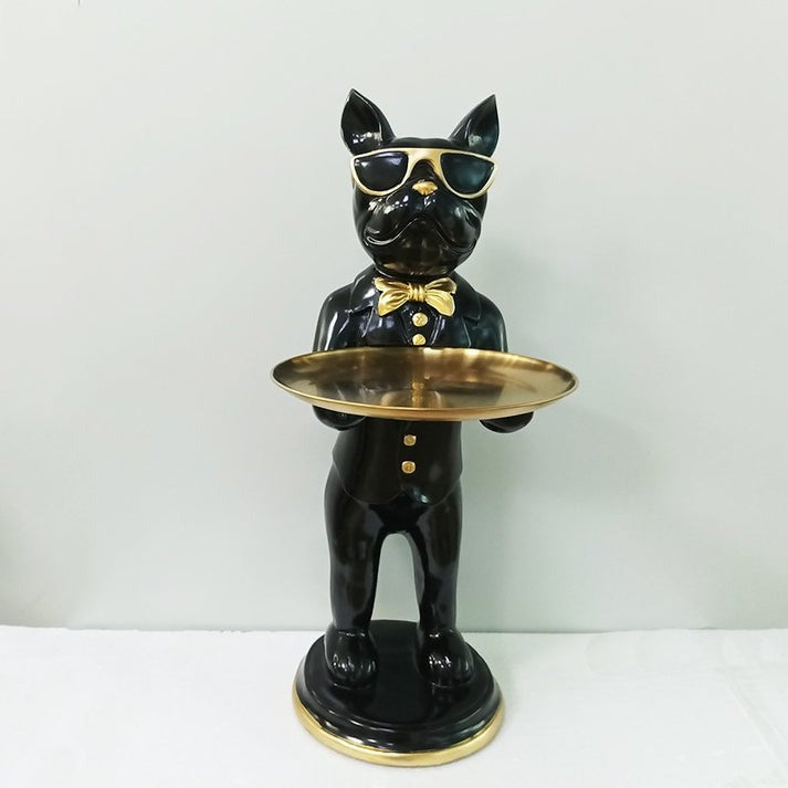 Bulldog figurine holding a round gold tray