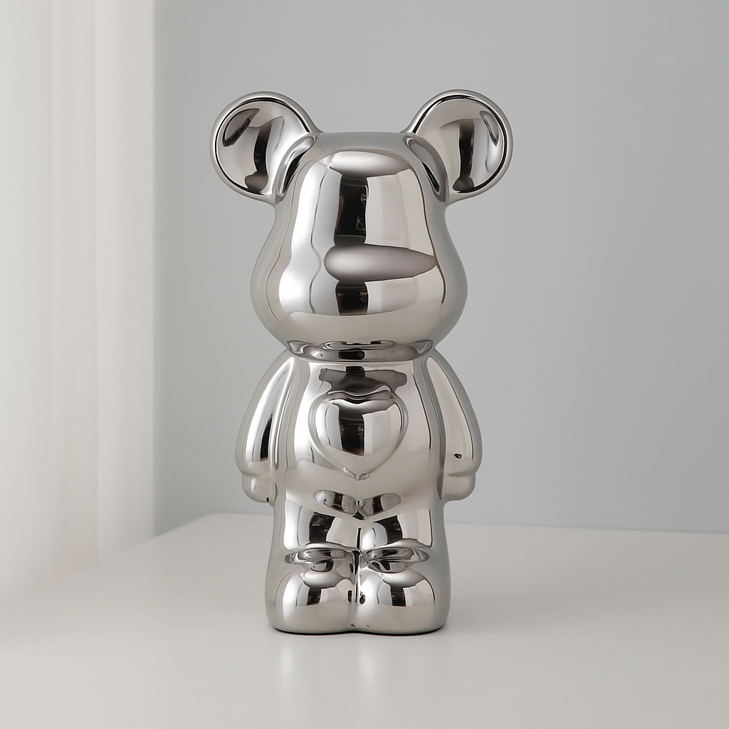Bear figurine with mirrored metallic surface