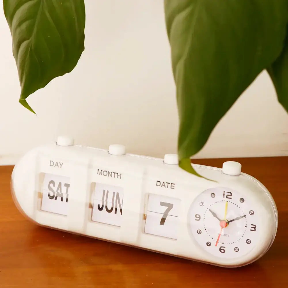 Table clock with calendar and analog dial