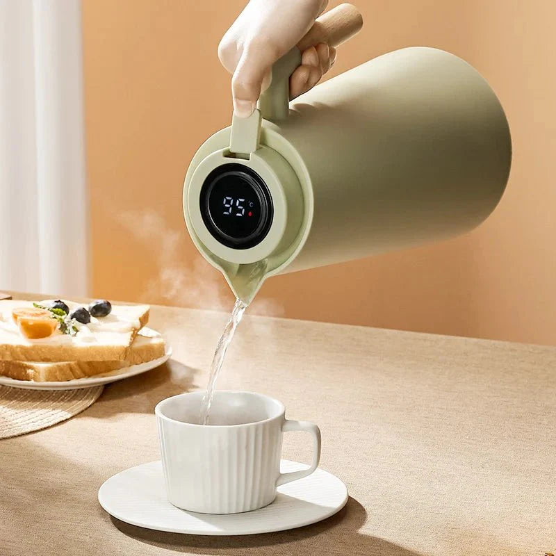 Pouring jug with digital temperature display and handle