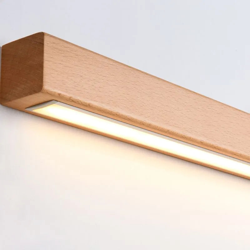 Liniowa lampa ścienna nad lustro z drewnianą obudową
