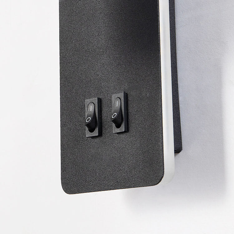 Minimalist LED wall sconce with a rotating reading spotlight