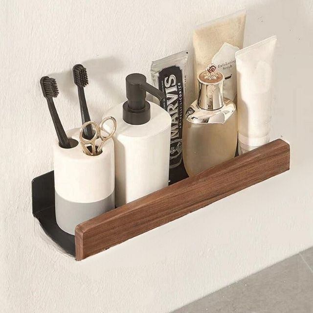 Wandplank voor badkamer met verhoogde rand voor opslag