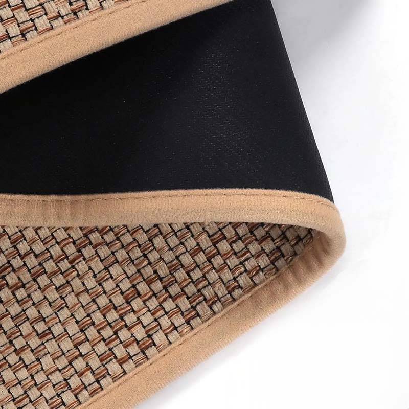 Woven floor mat with textured surface and backing
