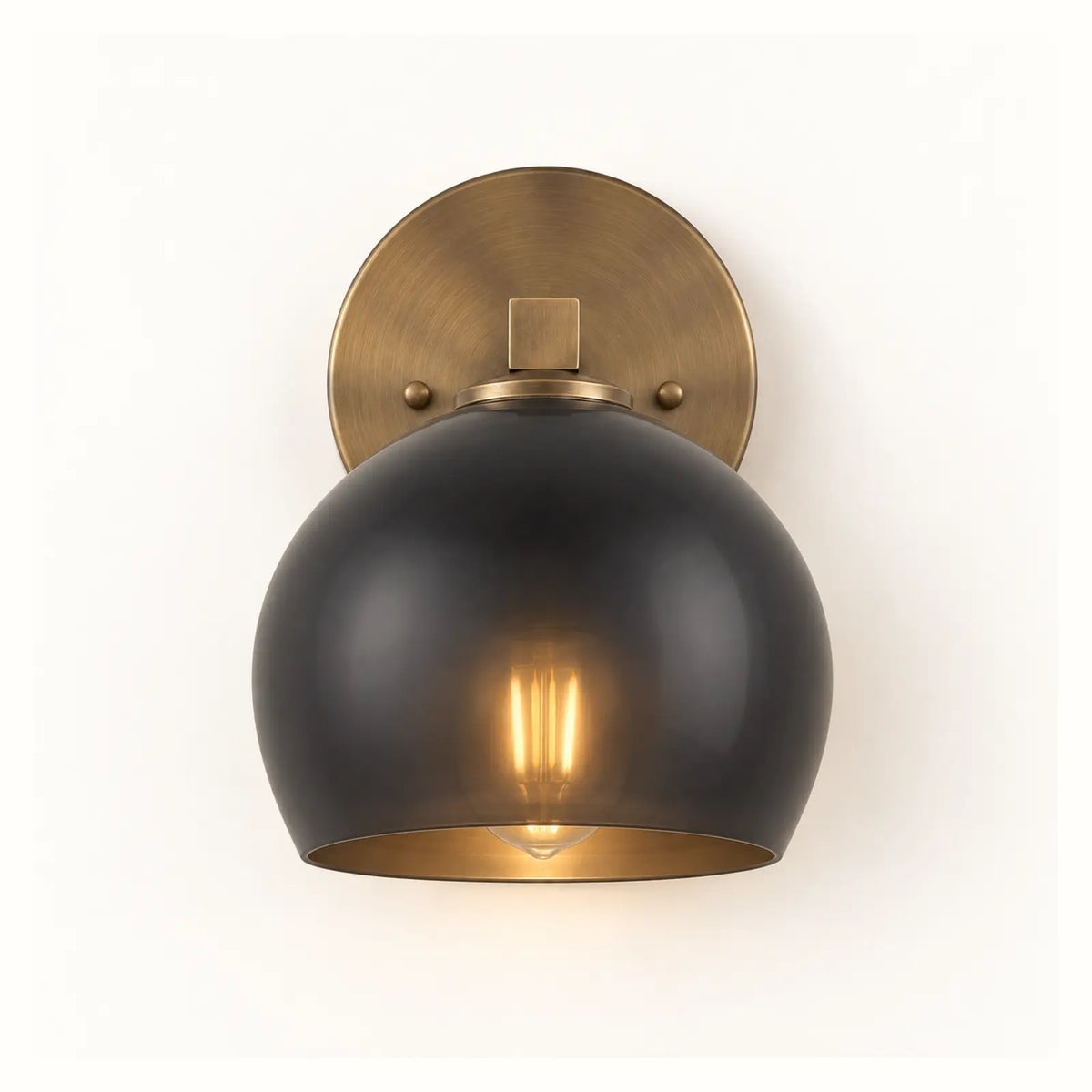 Colorful glass globe wall sconce with a metal frame in Japandi style