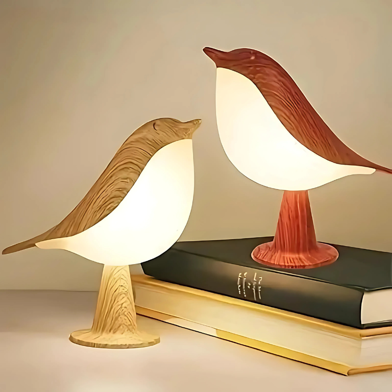 Tafellamp in vogelvorm met verlicht lichaam