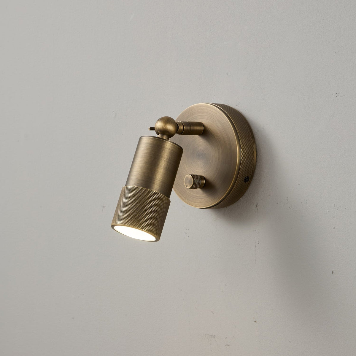 Modern Adjustable Wall Sconce with Integrated LED Lighting