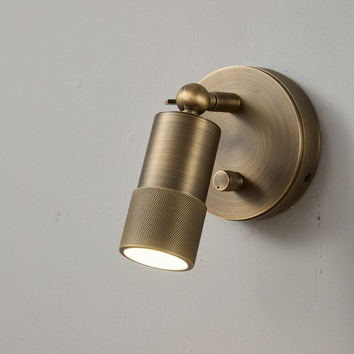 Modern Adjustable Wall Sconce with Integrated LED Lighting