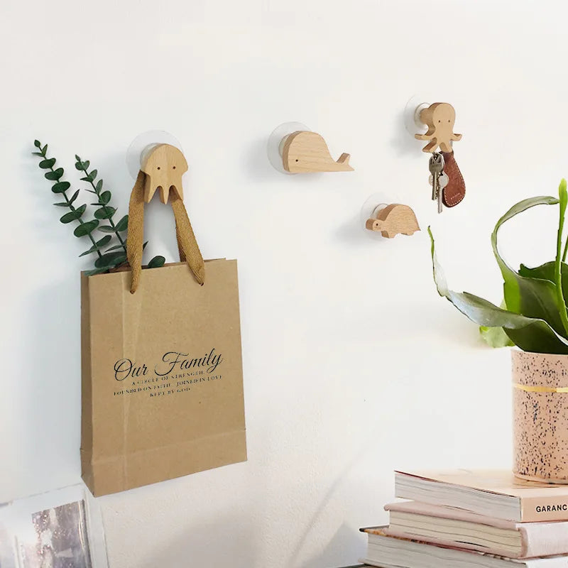 Wooden animal-shaped wall hook with adhesive base