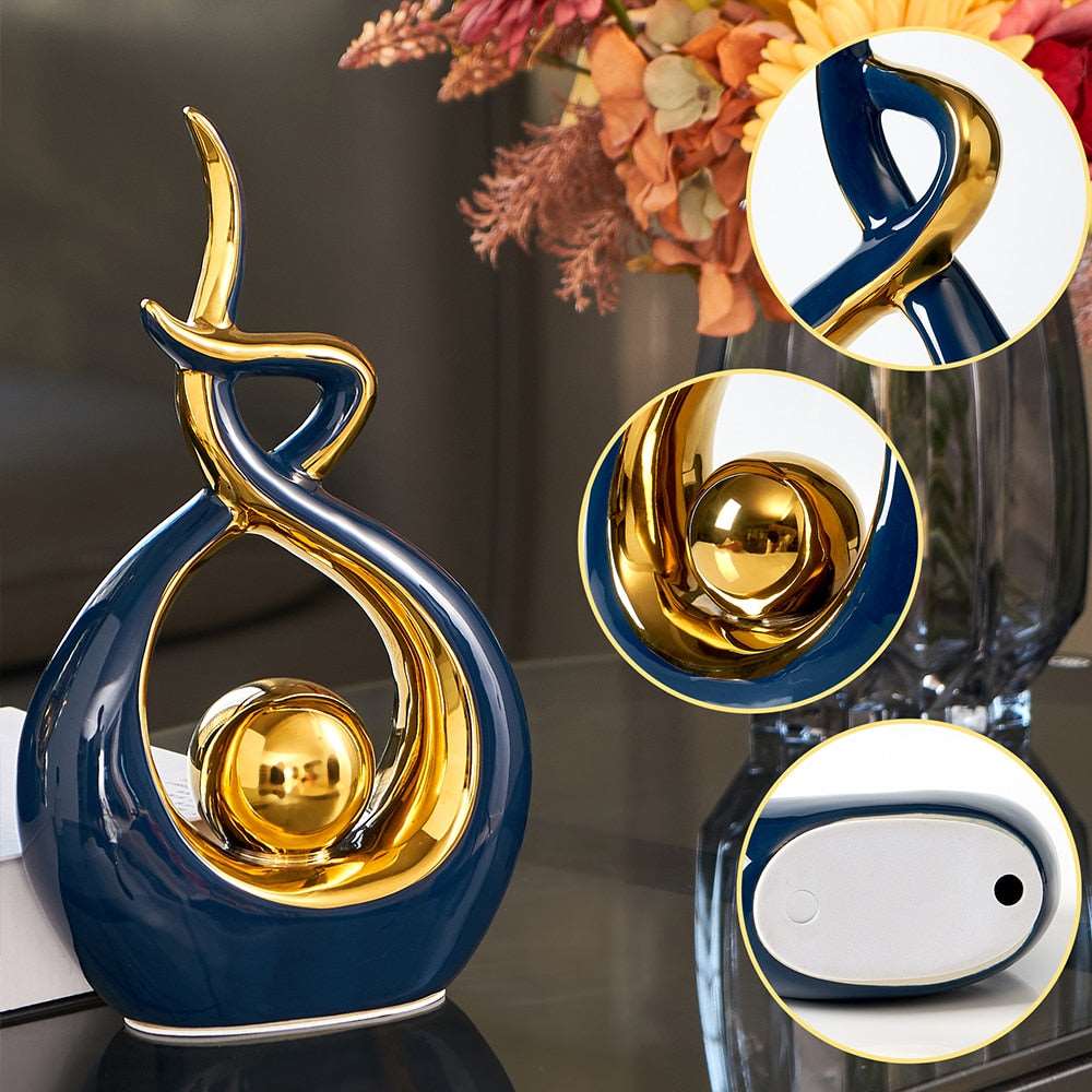 Ceramic abstract figurine with golden sphere