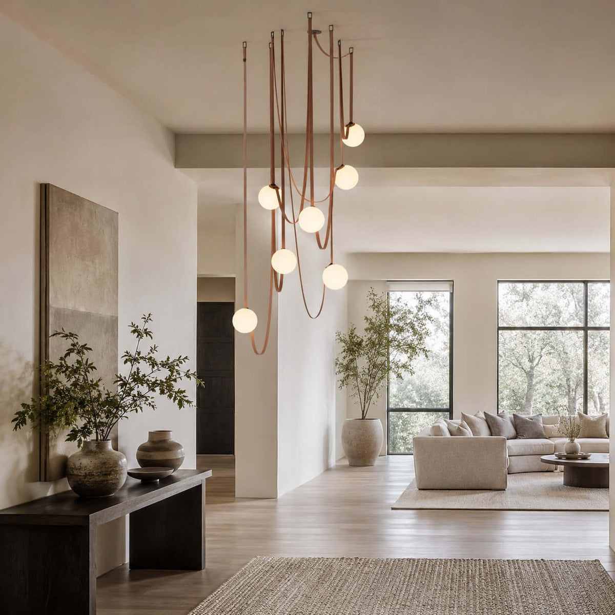 Modern ceiling light with an asymmetrical design and illuminated spheres