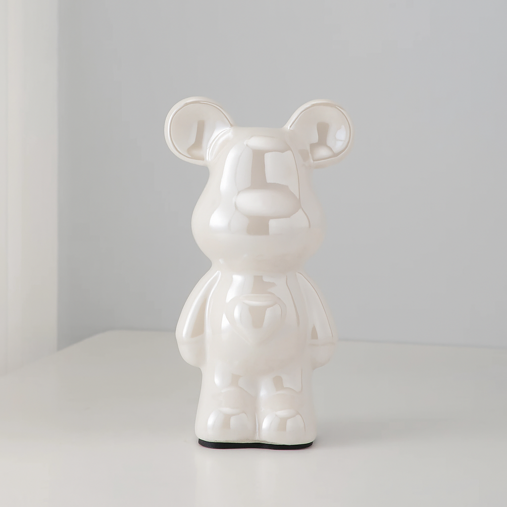 Bear figurine with mirrored metallic surface