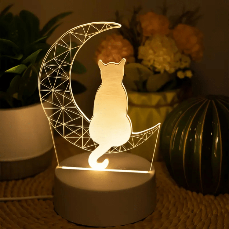 LED-nachtlampje met een kat die op de maan zit