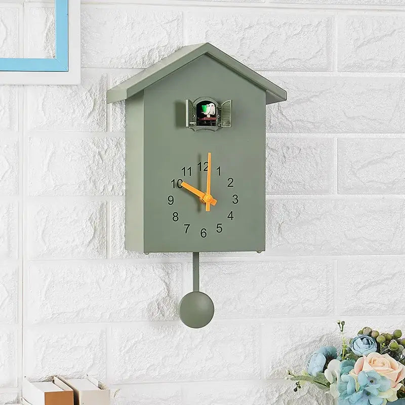 Wandklok huisje met koekoek en slinger