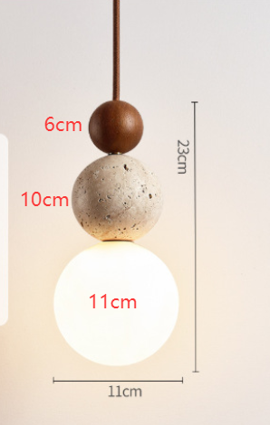 Minimalistyczna lampa wisząca o kulistym kształcie