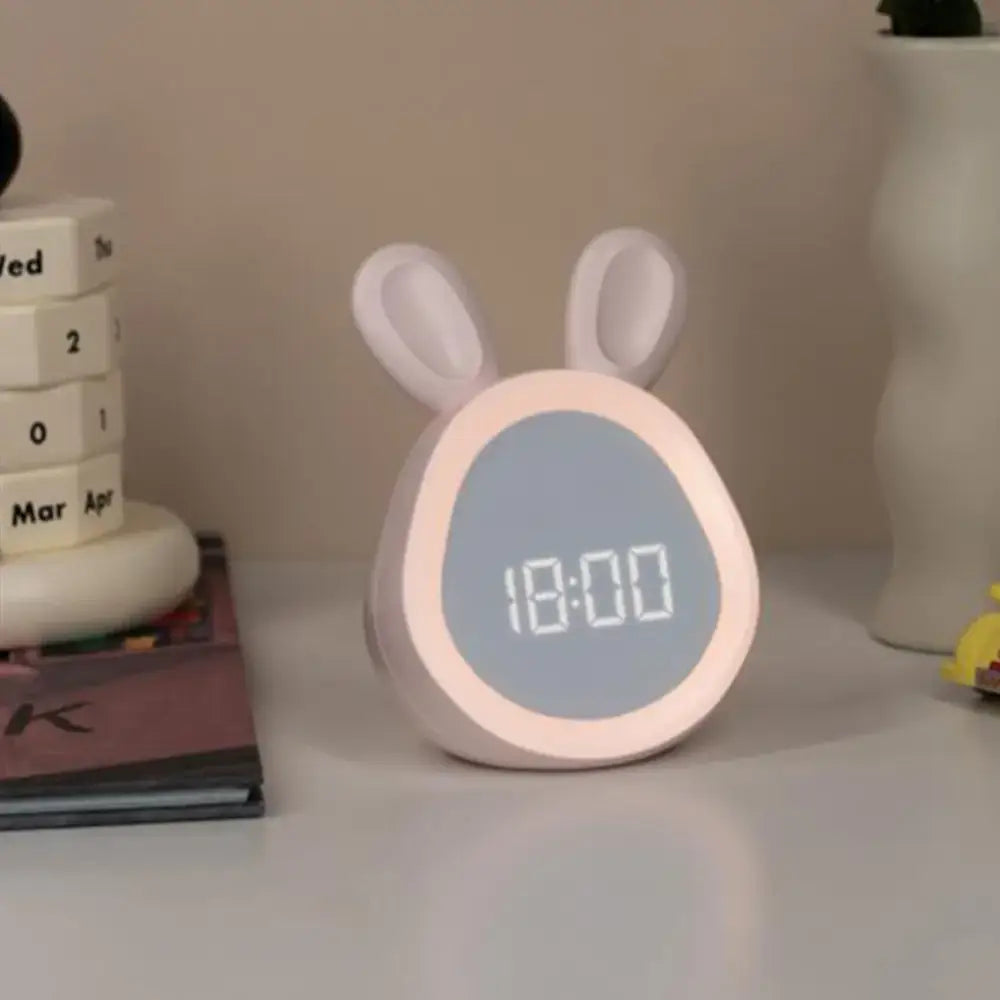 Digital alarm clock shaped like a rabbit with backlight