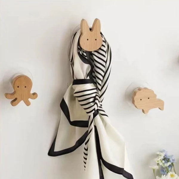 Wooden animal-shaped wall hook with adhesive base