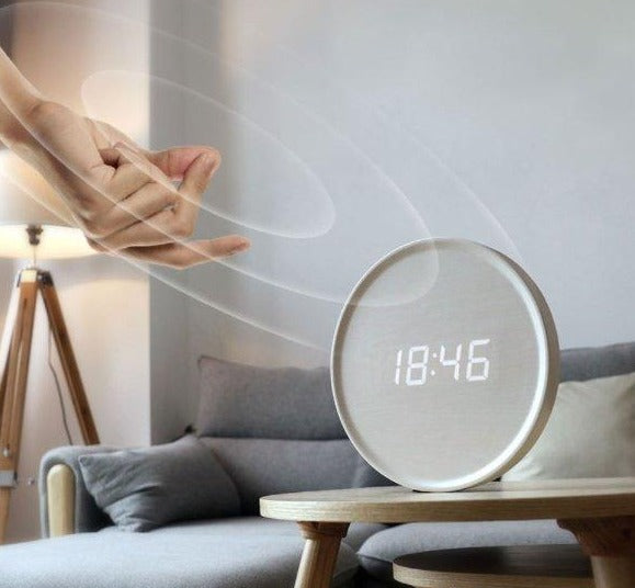 Round wall clock with digital time display