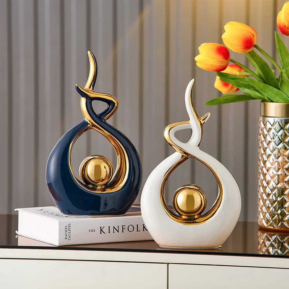 Ceramic abstract figurine with golden sphere